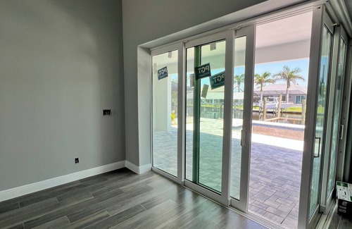 South Gulf Cove House | NEW WATERFRONT POOL HOUSE WITH PRIVATE DOCK – A Gulf Coast Escape from Ordinary