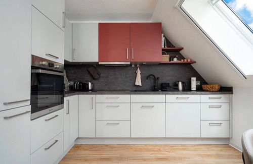 Eilsum Apartment | Newly built apartment (80sqm) with balcony directly on the water near Greetsiel!