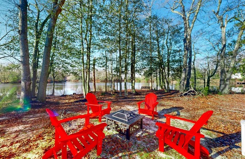 Seaford House | Newly built riverfront home with dock, kayaks, basketball court, & game room