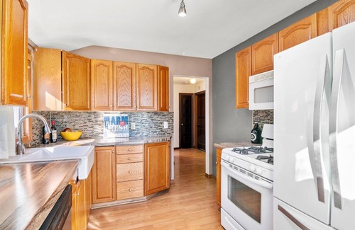 West Side House | Newly furnished home with spacious outdoor deck