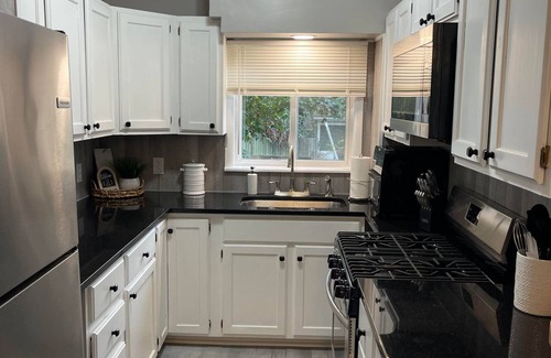 Sea Breeze House | Newly remodeled home. Walking distance to Seabreeze and to many things around