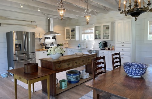 Bayville House | Newly Renovated Carriage House surrounded by water and lush gardens.