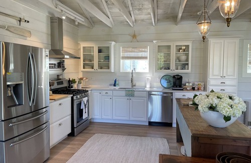 Bayville House | Newly Renovated Carriage House surrounded by water and lush gardens.