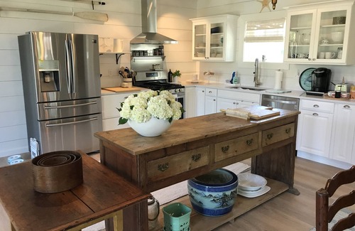 Bayville House | Newly Renovated Carriage House surrounded by water and lush gardens.