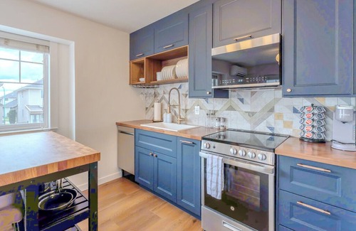 East Clayton Condo | Newly Renovated Mid Century Modern Coach House