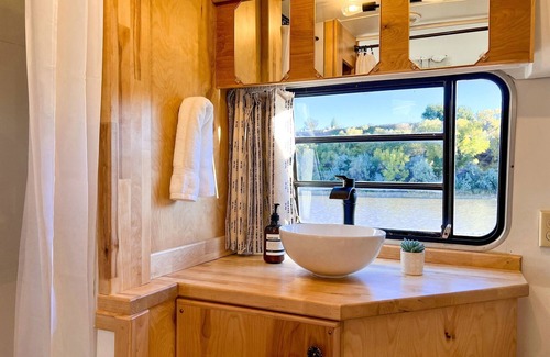 Pear Park House | Newly updated Avion with modern amenities on the bank of the Colorado River.