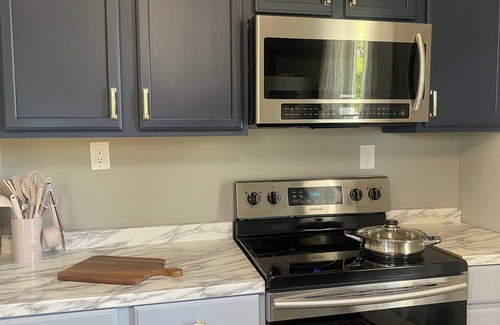 Burnside House | nHistoric beauty with partial lake views, walking distance to Burnside Marina!
