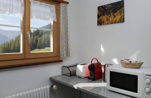 Frauenkirch Apartment | Nice apartment for 3 people with WIFI, TV, terrace, panoramic view and parking