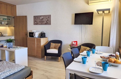 Bissone Apartment | Nice apartment for 4 guests with pool, WIFI, A/C, TV, balcony, panoramic view and parking