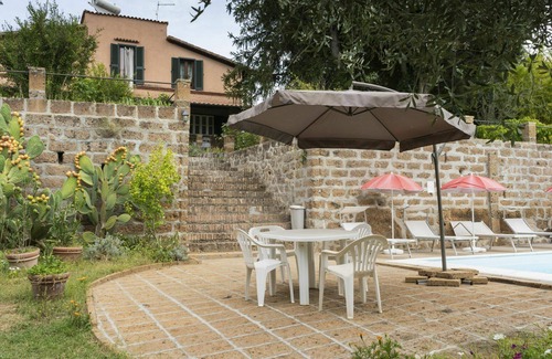 Corchiano Apartment | Nice apartment for 8 guests with WIFI, pool, TV, patio, pets allowed and parking