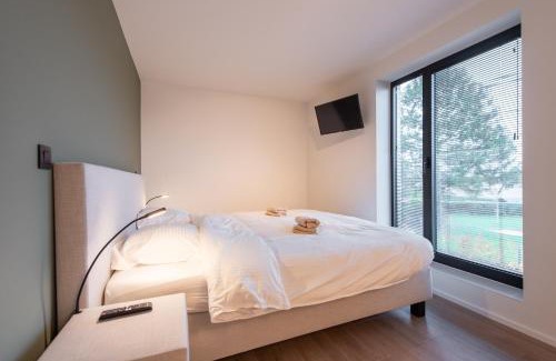 Riemst House | NIEUW - De Grenspaal OOST 7P - 3SLPK - SAUNA - LAADPAAL
