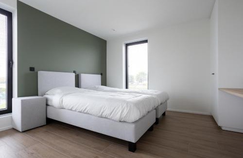 Riemst House | NIEUW - De Grenspaal WEST 6P 5 min Maastricht - Sauna - Laadpaal