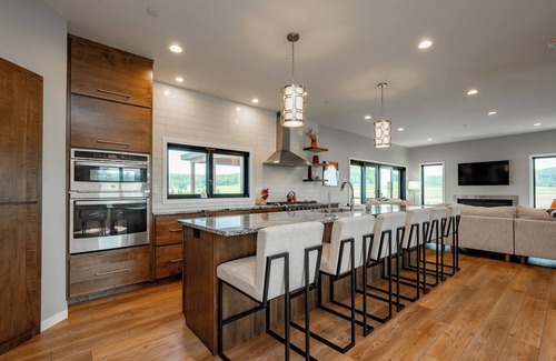 Waterfront Greens House | Night & Day: Lake Access, Hot Tub!