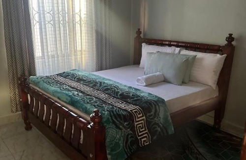 Kampala House | NM GUESTHOUSE