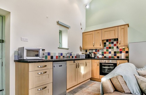 Capel Coch Cottage | NO 1 THE GRANARY, pet friendly, with open fire in Llannerch-Y-Medd