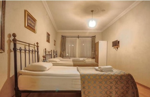 Goreme House | Nomads - Triple Room at the heart of Cappadocia