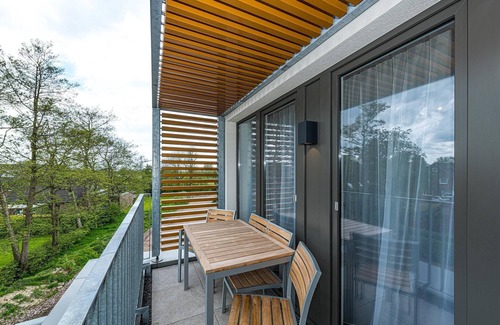 Bensersiel Apartment | Nordseenahes Ferienapartment mit Balkon, Parkplatz, Schwimmbad- & Saunanutzung