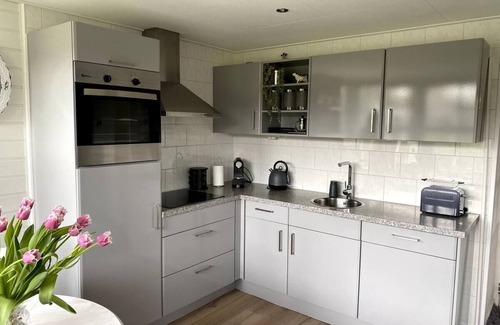 Oudeslius House | North Sea idyll near Callantsoog: Cozy & quiet vacation home with swimming pool