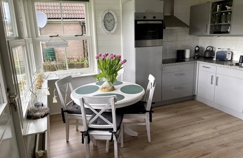 Oudeslius House | North Sea idyll near Callantsoog: Cozy & quiet vacation home with swimming pool
