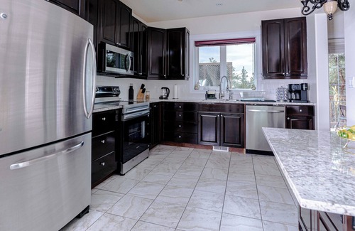 Yellowknife House | Northern Solace, 2 bedrooms, 2 bathrooms, kitchen, living room, Airport pick up