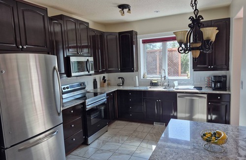 Yellowknife House | Northern Solace, 2 bedrooms, 2 bathrooms, kitchen, living room, Airport pick up