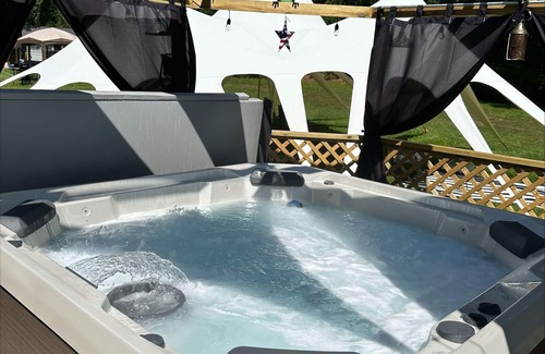Athens RV Rental | Northwoods Glamping Tent with WiFI, AC/Heat, Hot Tub, ATV and Snowmobile Access