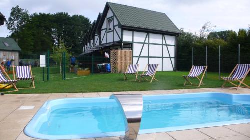 Chlopy Resort | Ośrodek domków letniskowych Sztorm
