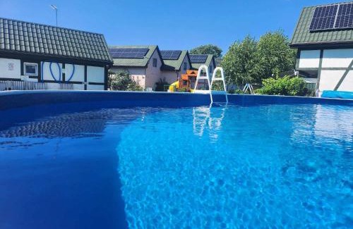 Chlopy Resort | Ośrodek domków letniskowych Sztorm