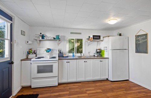 York Cottage | Ocean Breeze Cottage, Spacious 2 BRs, living room, full bathroom & a patio.