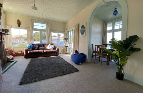 Pounawea House | Ocean front, large, historic, character house, suitable for families and groups.