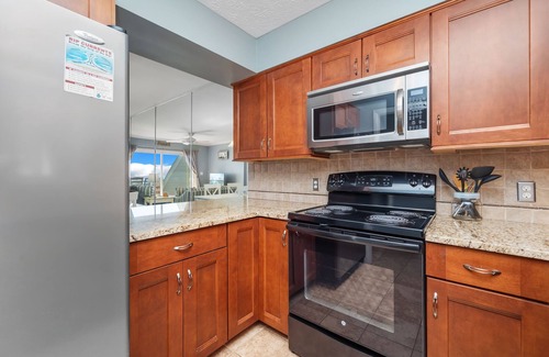 Caswell Beach Condo | Ocean Front Paradise: Centrally Located Condo with Pool Access