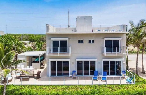 North Side House | Ocean's Edge: Beachfront Home with Rooftop Views