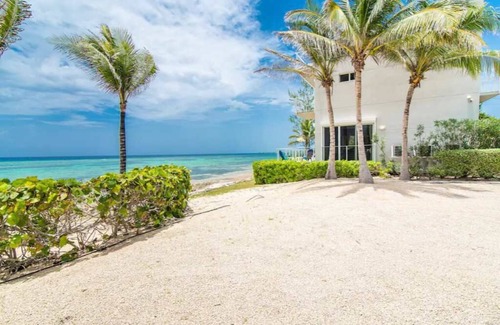North Side House | Ocean's Edge: Beachfront Home with Rooftop Views