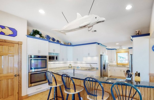 Buck Island House | Ocean-side home with heated pool, hot tub & elevator
