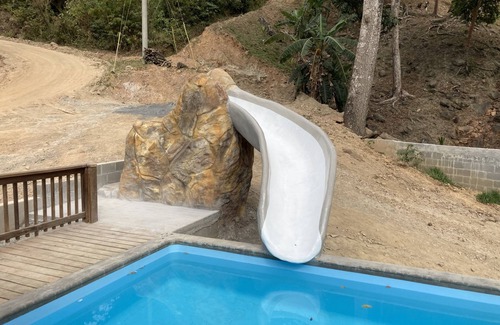 Diamond Rock House | Ocean view with a pool and custom water slide!