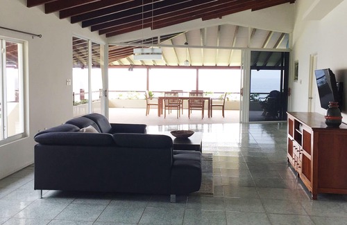 Bisento House | Ocean view villa in gated community beside Cas Abao beach.