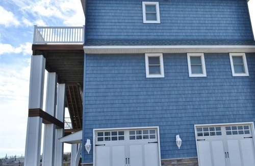 North Beach House | Oceanfront. Beach Badges/Equipment. WiFi. Decks. Hot Tub. Outdoor Shower. 140069