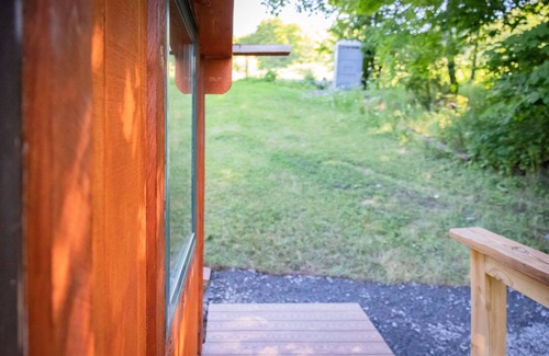 Town of Broome Cabin | Off-Grid, Buck Tiny House with Indoor Soaking Tub & Mountain Top Views