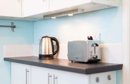 Cockett House | Off Road parking, Garden, TV in Every Room