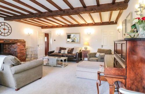 Lichfield Cottage | OLD BARN, pet friendly, with a garden in Whittington, Staffordshire
