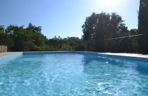 Castiglione della Valle Apartment | Oliva Apartment with solar heated pool set in the Umbrian countryside