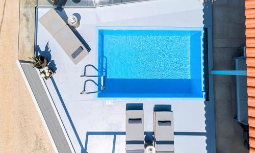 Vathi Villa | Olive Green Villa Heated Pool