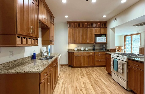 Algonquin Apartment | On the Fox/River access/Kayaks/Deck with lounging and dining/Free Parking