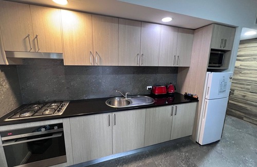 Hamilton Apartment | One Bedroom Deluxe Spa Apartment