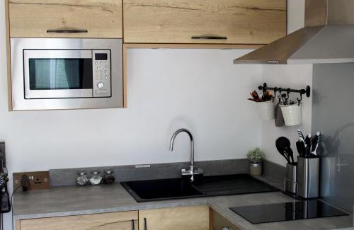 Uplands Apartment | One One Five Apartment