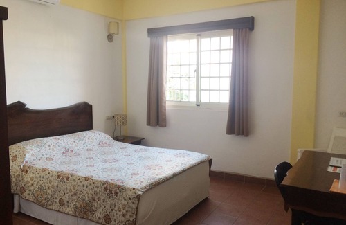 Belize City Hotel | ONE QUEEN BED ROOM AT EASY INN BELIZE CITY