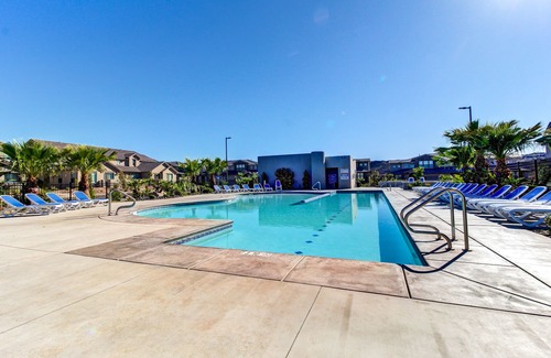 Sienna Hills House | Open-concept townhome with grill, pool, tennis court, & central AC