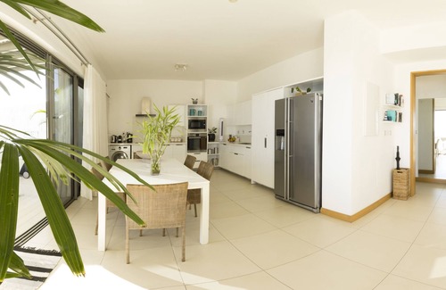 Wolmar Apartment | OPEN SKY penthouse | Cap Ouest, Wolmar | Feet in the water | Cleaning & cooking