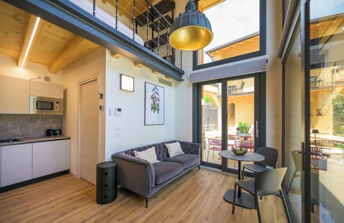 Crociale Apartment | Open space on two floors in detached cottage in ancient medieval courtyard