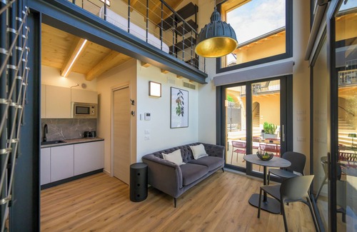 Crociale Apartment | Open space on two floors in detached cottage in ancient medieval courtyard